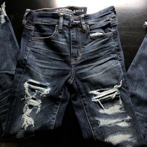 Dark blue ripped jeans